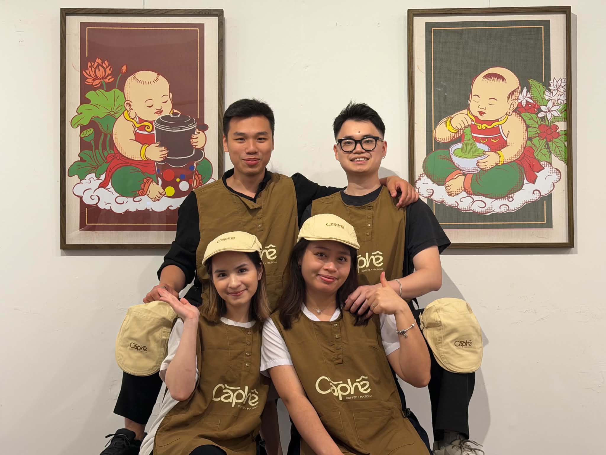 Four friends planning Cà Phê